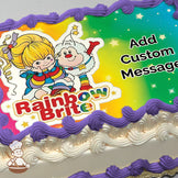 Cartoon illustration of Rainbow Brite and her white furry companion, Twink, on a rainbow gradient background with stars, printed on a photo sheet cake.