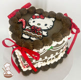 Heart-shaped brown cake with piped brown and white frosting, featuring a Hello Kitty design on top. Decorated with red satin bows and candy cane accents.