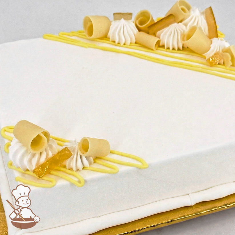 Sheet cake with white frosting, decorated with yellow buttercream lines, white chocolate curls, and candied lemon peels.