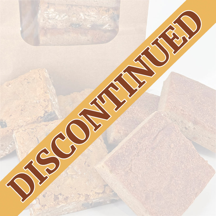 Three snickerdoodle blondies and three oatmeal raisin blondies are arranged together in front of a kraft window bag.