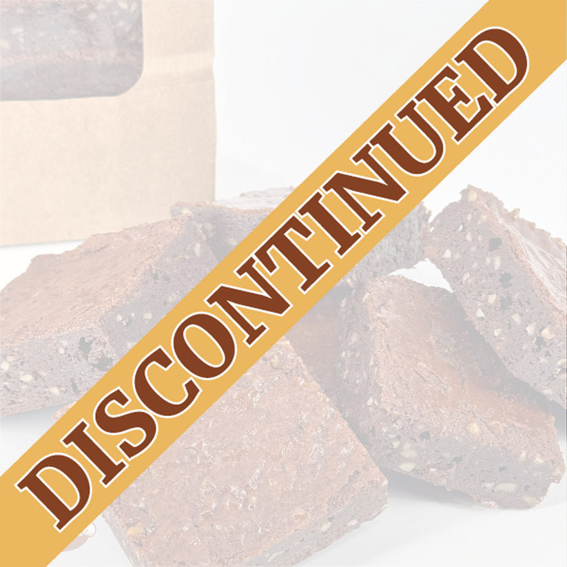 Six chocolate brownies made with Belgian chocolate and walnuts are arranged in front of a kraft window bag.