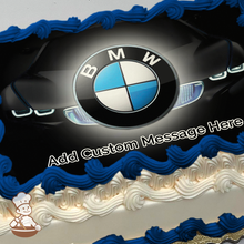 Load image into Gallery viewer, BMW car logo printed on extra cake layer and decorated on sheet cake.