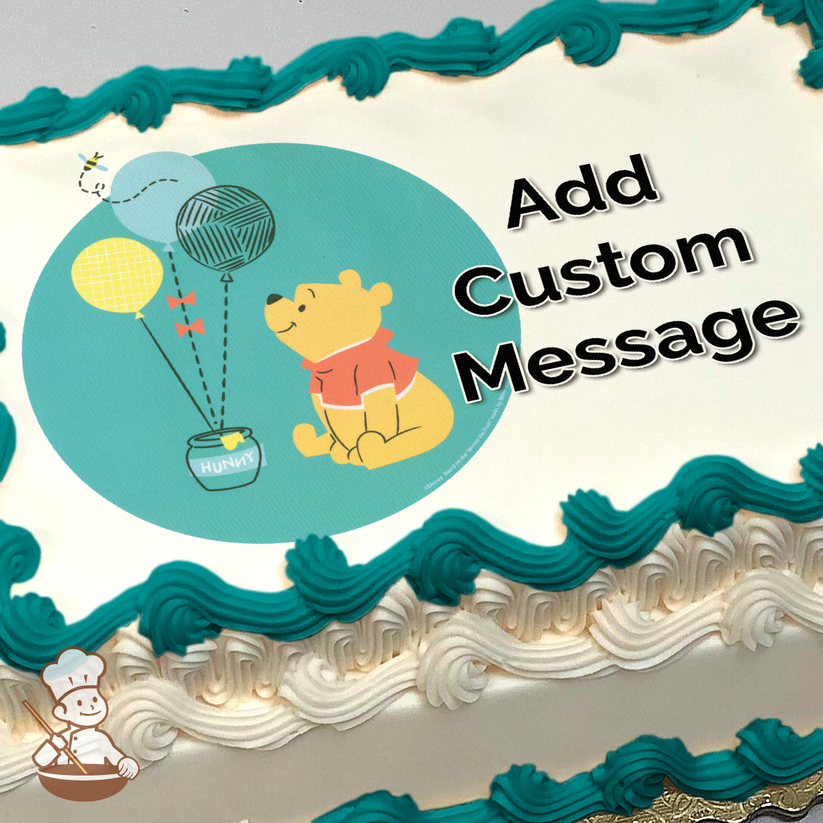 Winnie the Pooh with balloons and a honey pot, alongside a small chef character, on a teal background, printed on a sheet cake.