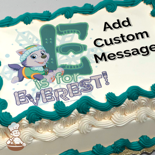 Cartoon of Everest from PAW Patrol sliding down a snowy hill with the text "E is for Everest!" on a printed sheet cake.