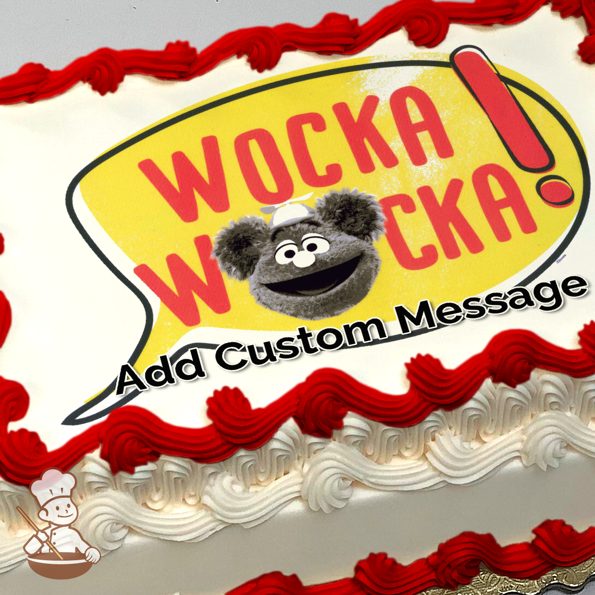 Cartoon of Fozzie Bear with a "Wocka Wocka!" speech bubble, printed on a sheet cake.