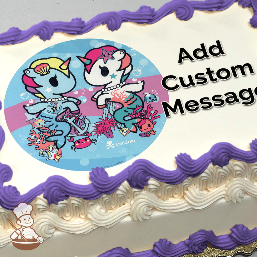 Illustration of tokidoki characters Unicorno and Mermicorno with ocean-themed decorations, printed on a sheet cake.
