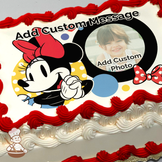 Minnie Mouse winking with a polka dot bow, colorful dots background, printed on a sheet cake.