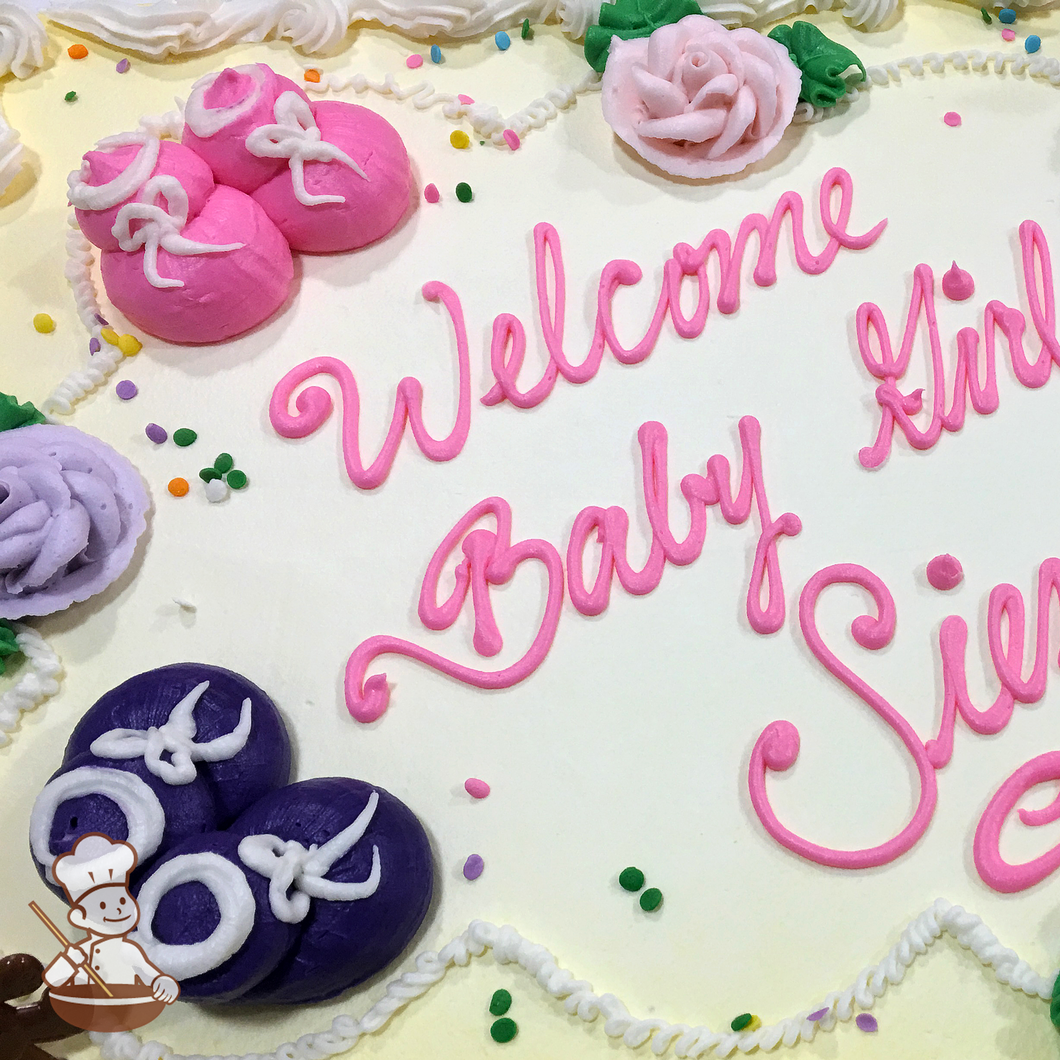 Baby shower sheet cake with hand piped buttercream baby bootie shoes, roses and sprinkles.