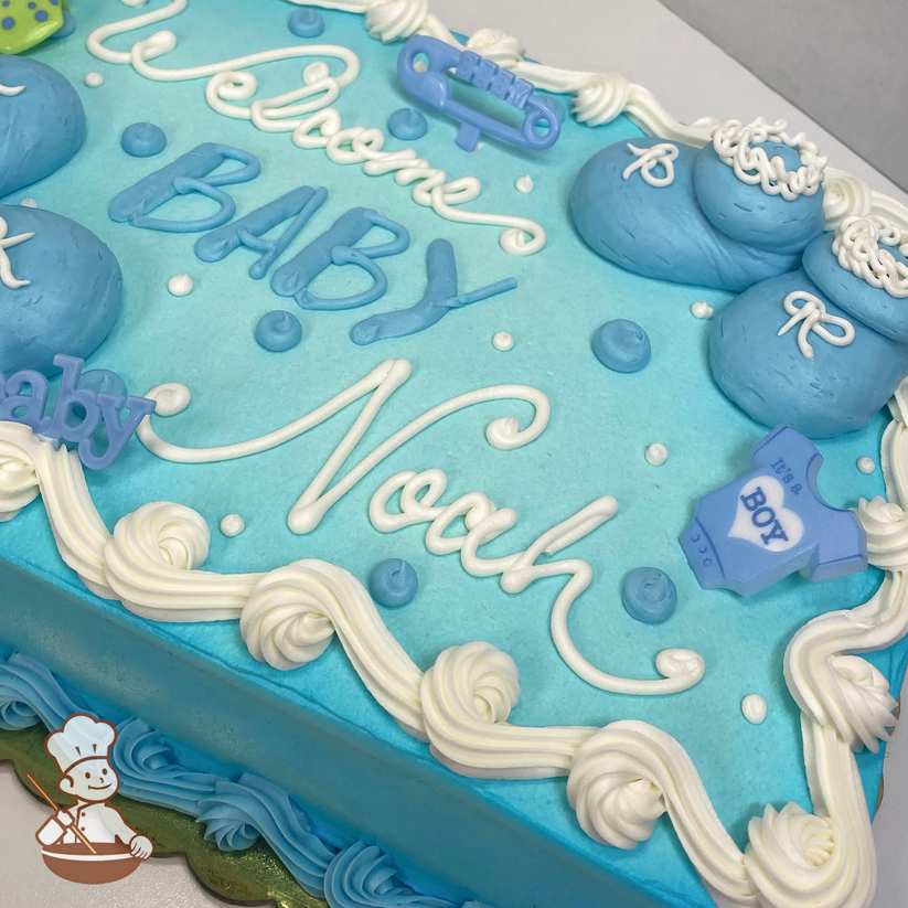 Baby shower sheet cake with hand piped buttercream baby bootie shoes.