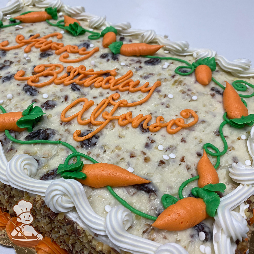 Cute sheet cake with hand piped buttercream carrots on vines.