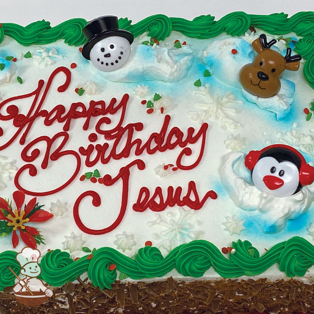 Birthday sheet cake with snowflakes, poinsettias and sprinkles and Christmas snowman, penguin and reindeer ring toys. 