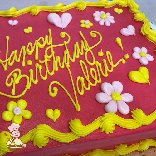 Popular sheet cake with buttercream piped hearts and daisy flowers.