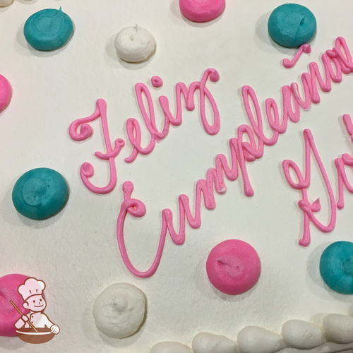 Modern sheet cake with buttercream piped dots.