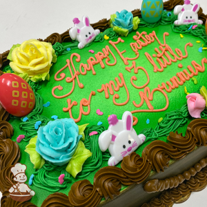 Easter sheet cake with spring rose garden and bunnie, eggs, and buttercream roses.