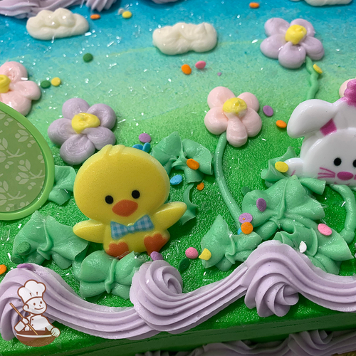 Easter sheet cake with bunny, chick, eggs, and daisy flowers in a spring garden scene.