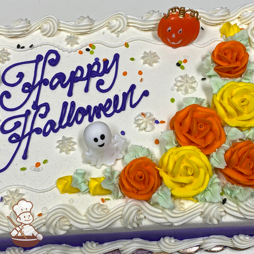 Halloween sheet cake with buttercream roses, star tips and sprinkles with ghost toy rings.