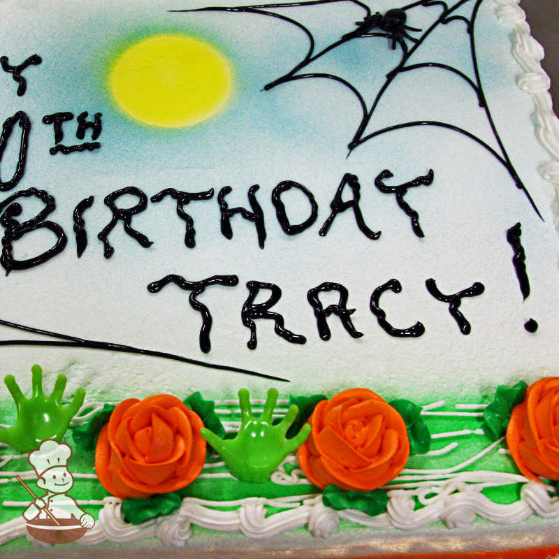 Birthday sheet cake with buttercream spider webs and roses with monster hands and spider toy rings.