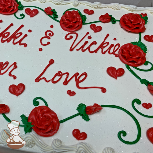 Anniversary sheet cake with buttercream roses and rosebuds on vines and hearts.
