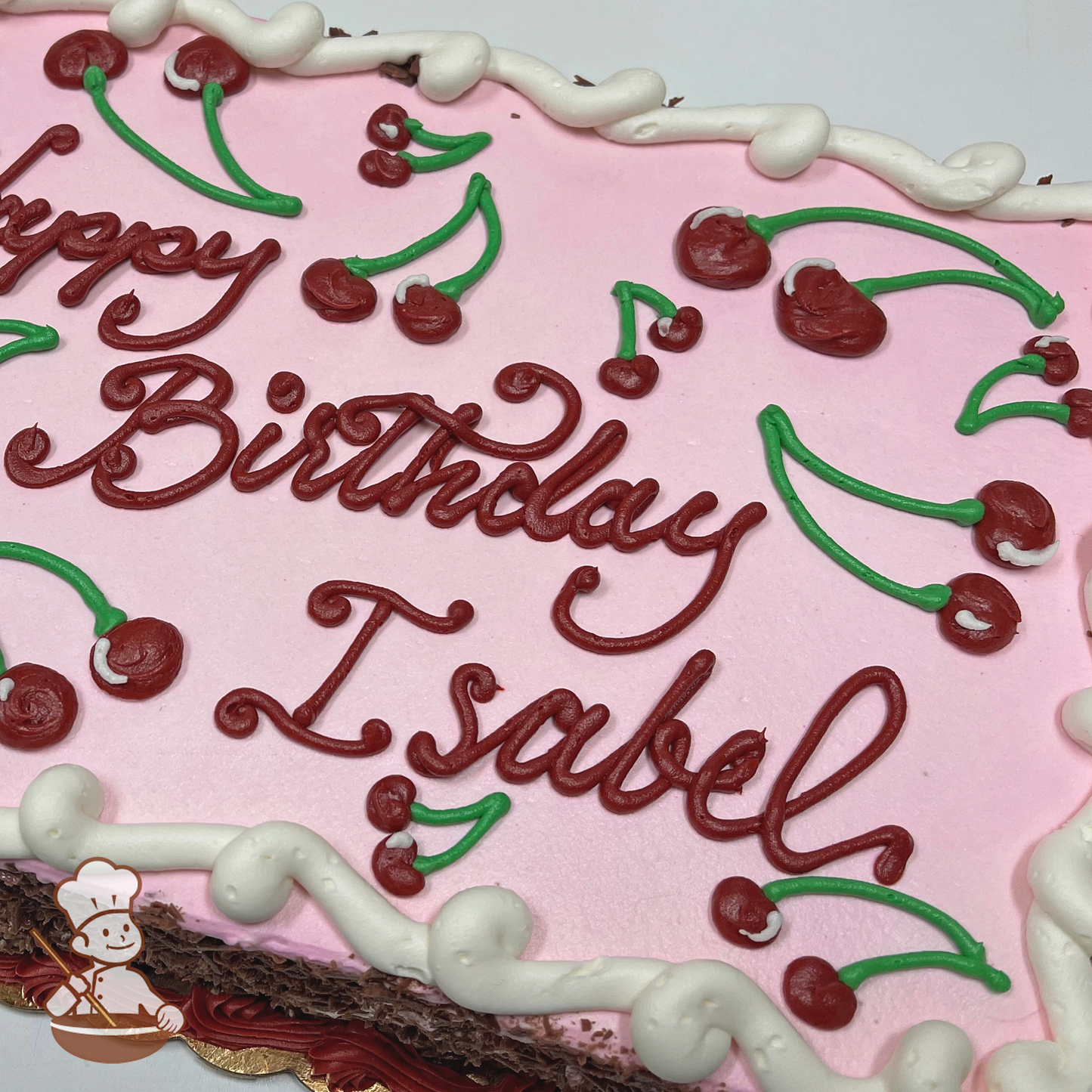 Birthday sheet cake with buttercream cherries.