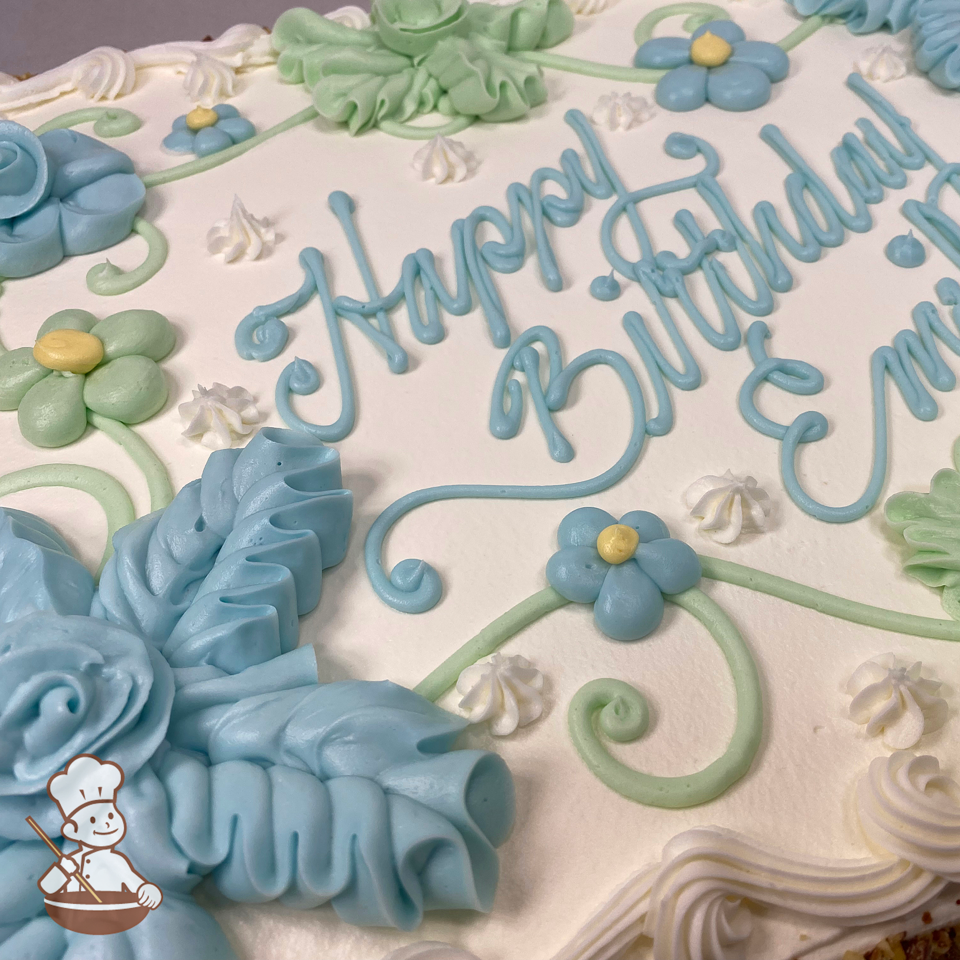 Birthday sheet cake with buttercream  Hawaiian flowers and daisies on vines.