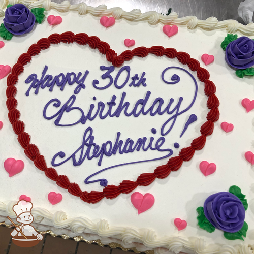 Birthday sheet cake with buttercream heart frame, mini hearts and roses.