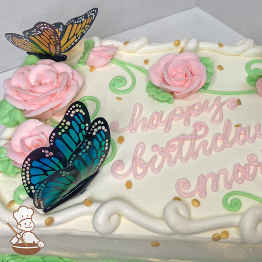 Birthday sheet cake with buttercream roses on vines with toy butterflies and sprinkles.