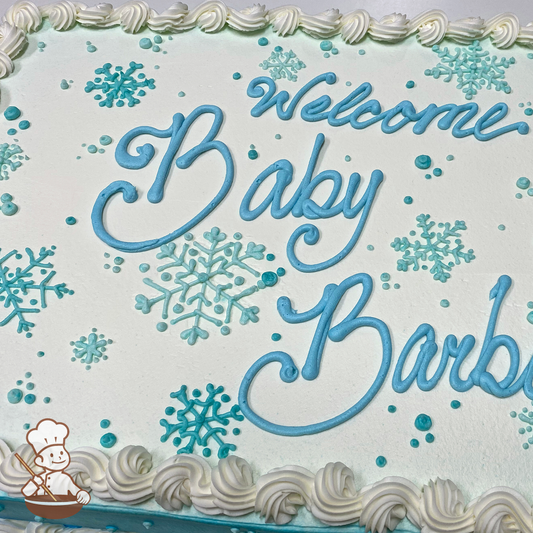 Baby shower sheet cake with buttercream snowflakes.