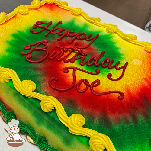 Birthday sheet cake with sprayed tie dye pattern.