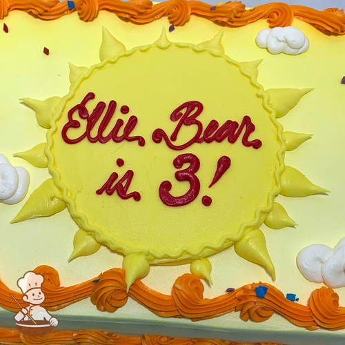Birthday sheet cake with buttercream sun and clouds with sprinkles.