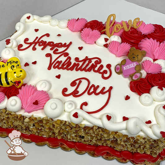 Valentine's sheet cake with sea shell pattern swirls, swirls, bee mine bee, love and teddy bear kisses with heart sprinkles.