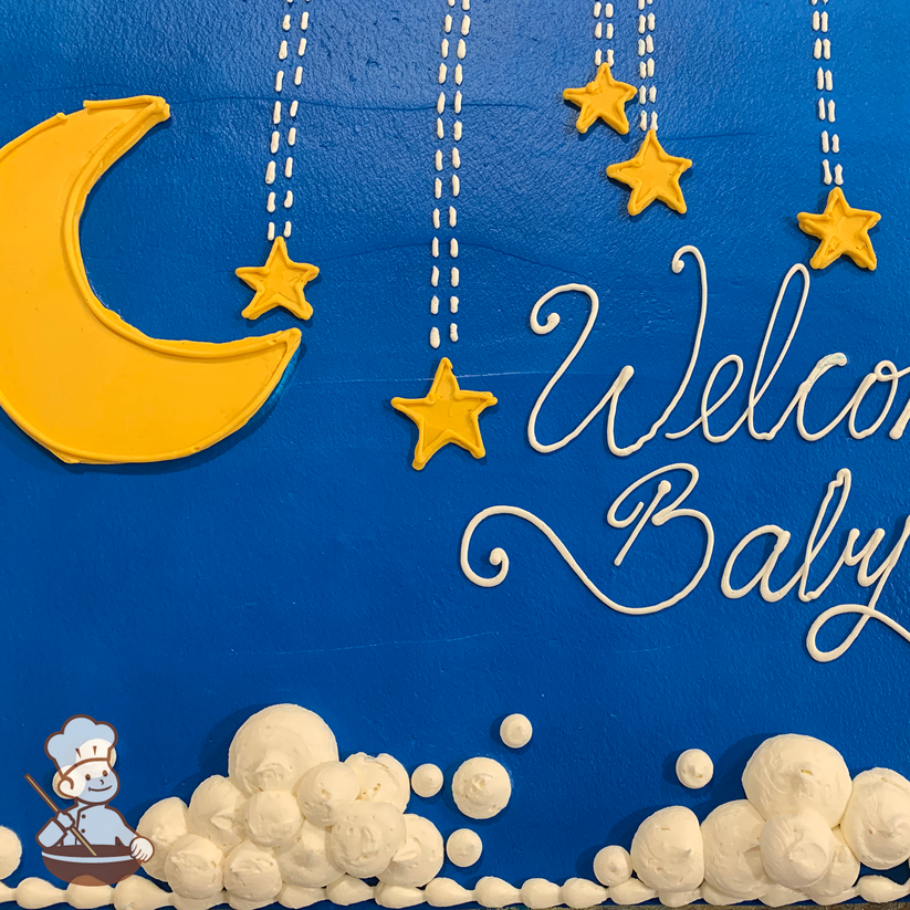 Baby shower sheet cake with buttercream crescent moon and hanging stars baby mobile.