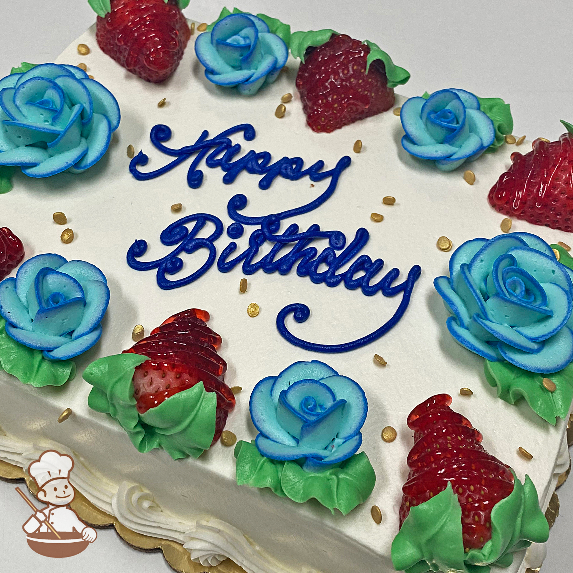 Birthday sheet cake with buttercream roses and fresh strawberries and sprinkles.