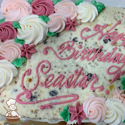 Birthday sheet cake with buttercream rosette swirls in the corners.
