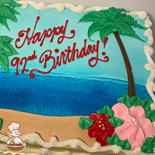 Birthday sheet cake with beach and ocean setting with tall palm trees and Hawaiian flowers.