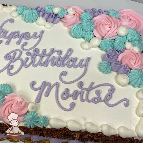 Birthday sheet cake with ocean and mermaid themed swirls, corals and pearls.