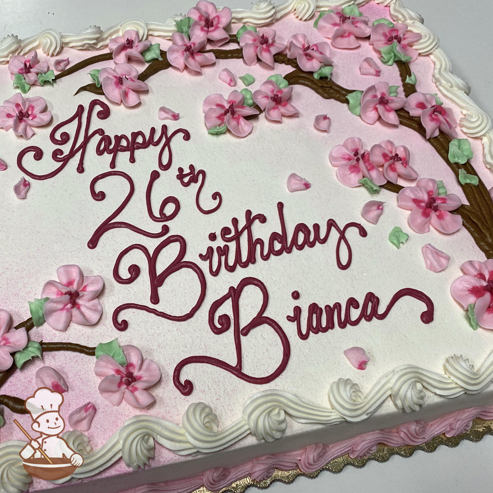 Birthday sheet cake with buttercream cherry blossom tree and flowers.