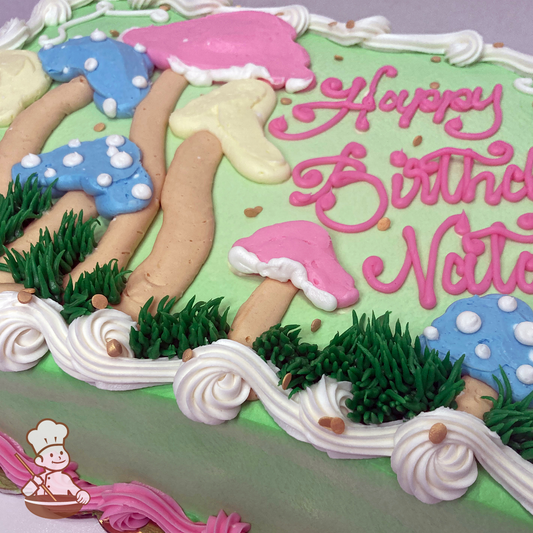 Birthday sheet cake with buttercream piped whimsical mushrooms and sprinkles.
