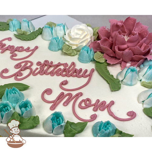 Birthday sheet cake with buttercream peonies and roses with freesia buds.