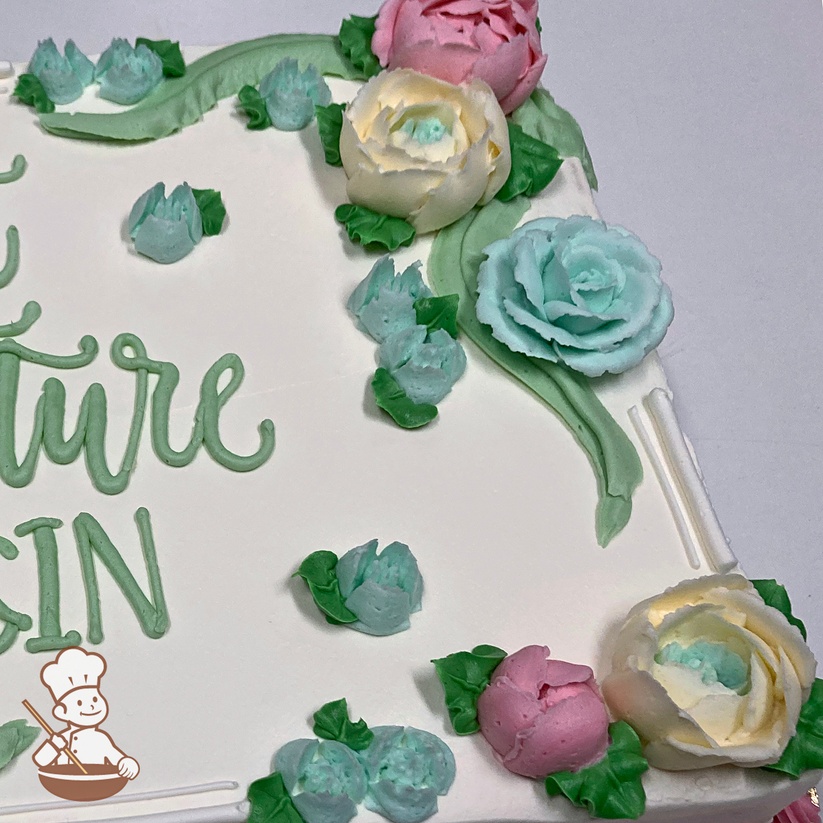 Baby shower sheet cake with buttercream roses, buttercups and freesia buds.
