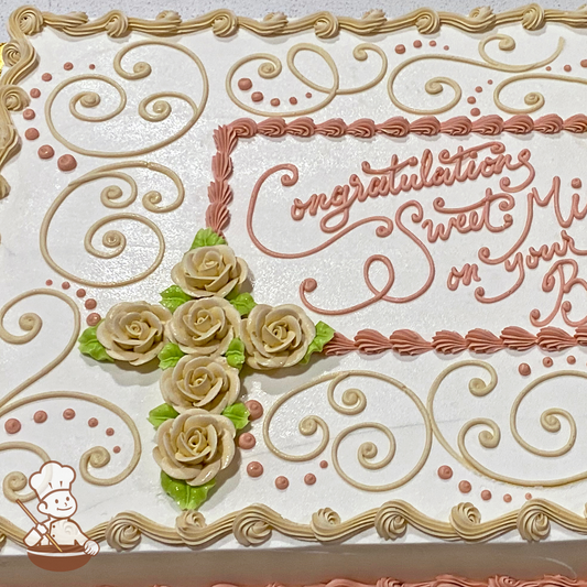 Baptism sheet cake with buttercream roses in shape of cross with scroll patterns and writing in a frame.