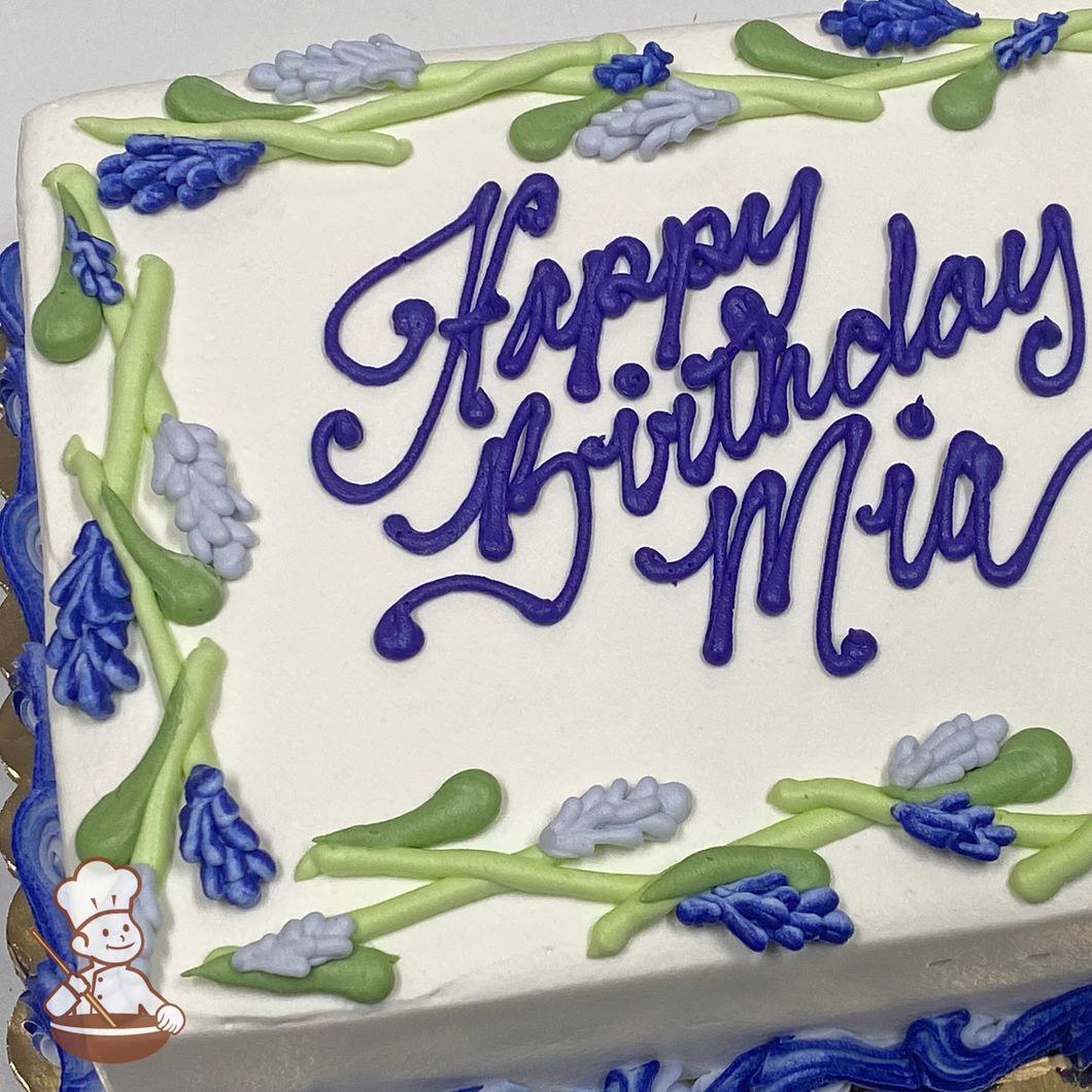 Birthday sheet cake with buttercream piped lavendar flowers.