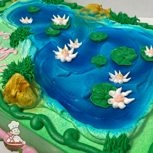 Celebration sheet cake with buttercream piped lily pad in a pond.