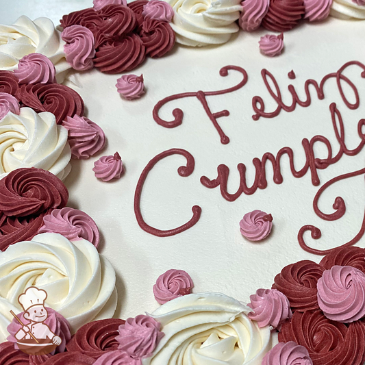 Birthday sheet cake with three color rosette swirls and swirlette flowers buttercream icing.