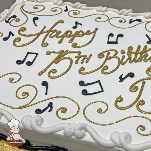 Birthday sheet cake with buttercream music notes with writing in gold piping.