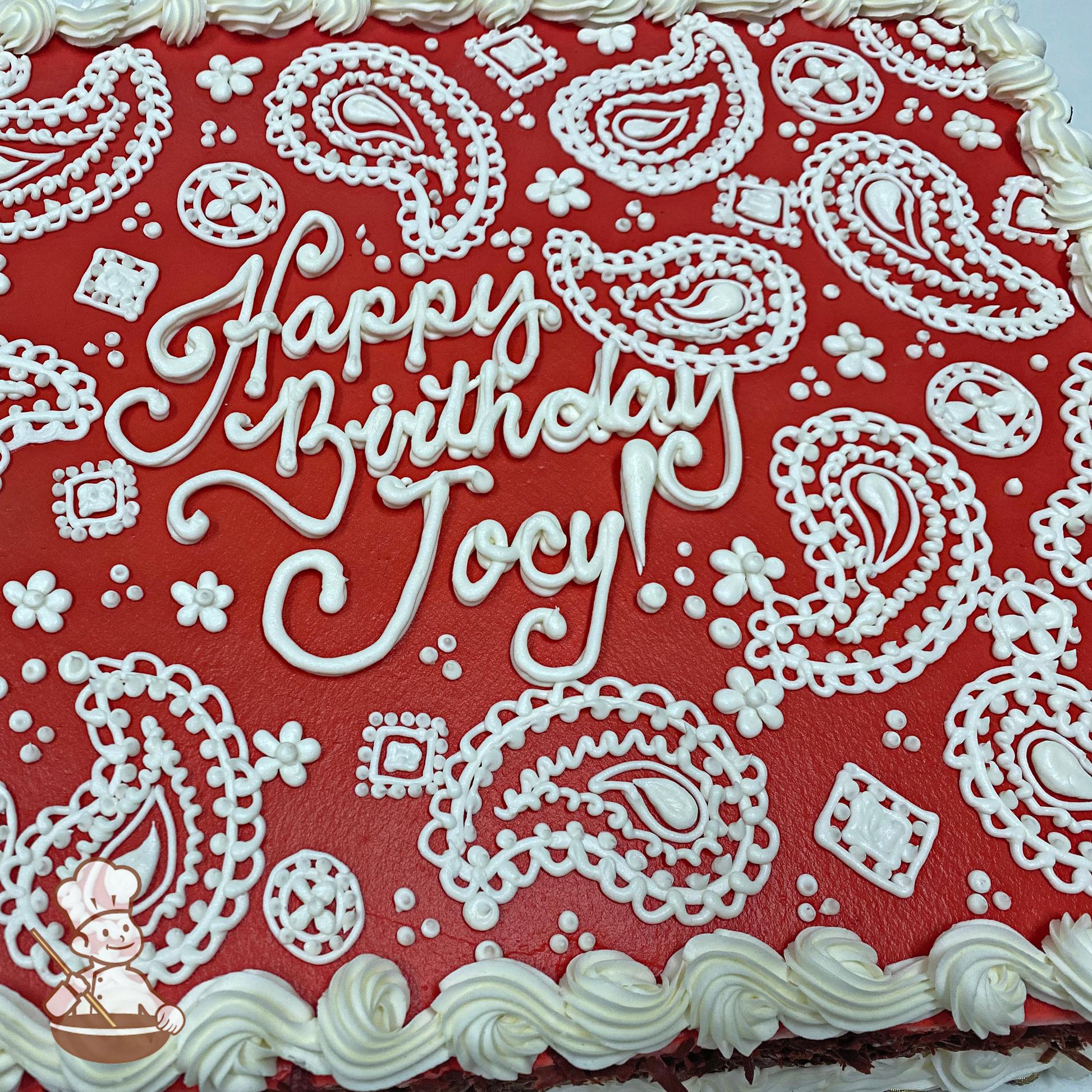 Birthday sheet cake with paisley patterns.