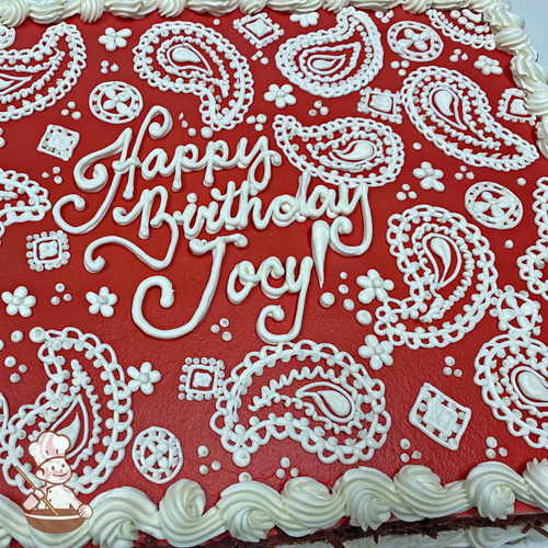Birthday sheet cake with paisley patterns.