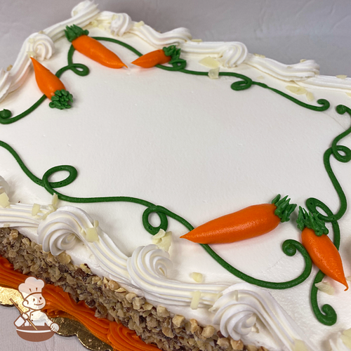 Carrot sheet cake with whipped cream icing, diced almonds on all four sides and decorated with buttercream carrots.