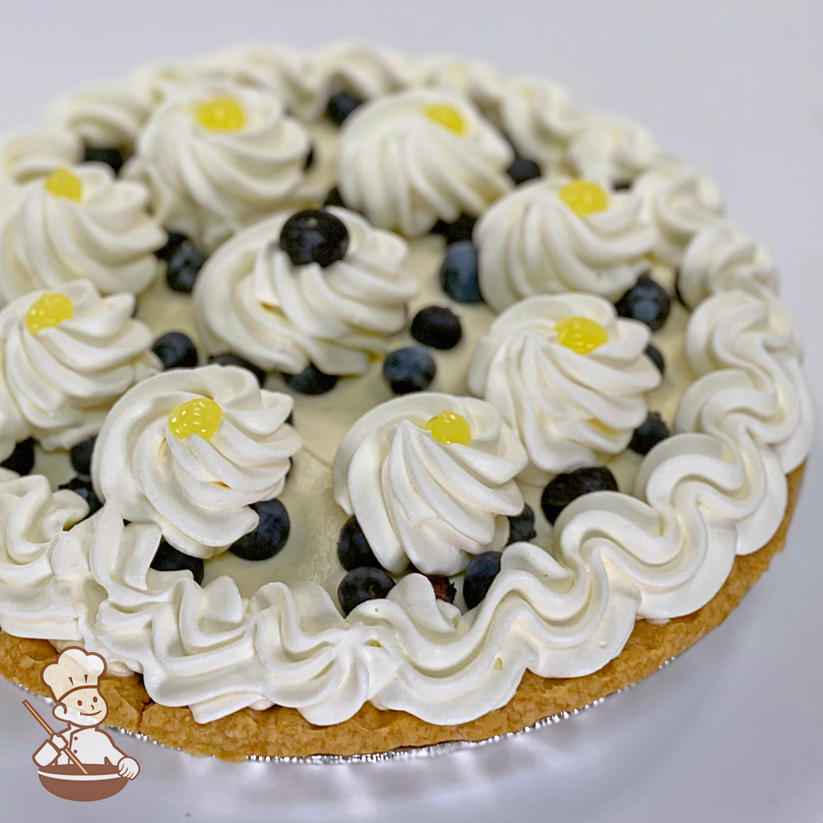 Lemon Cream Pie with fresh blueberries and whipped cream.
