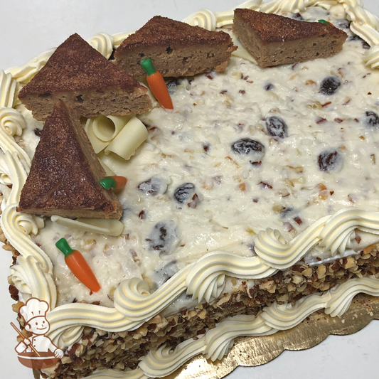 Carrot sheet cake with cream cheese icing and decorated with snickerdoodle blondies.