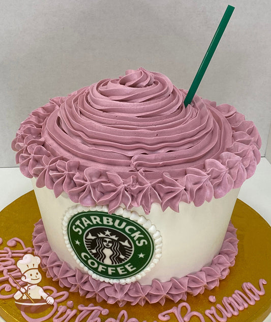 Single tier cake with white icing and decorated with mauve-colored details to look like a Frappuccino with the Starbucks logo in the front.